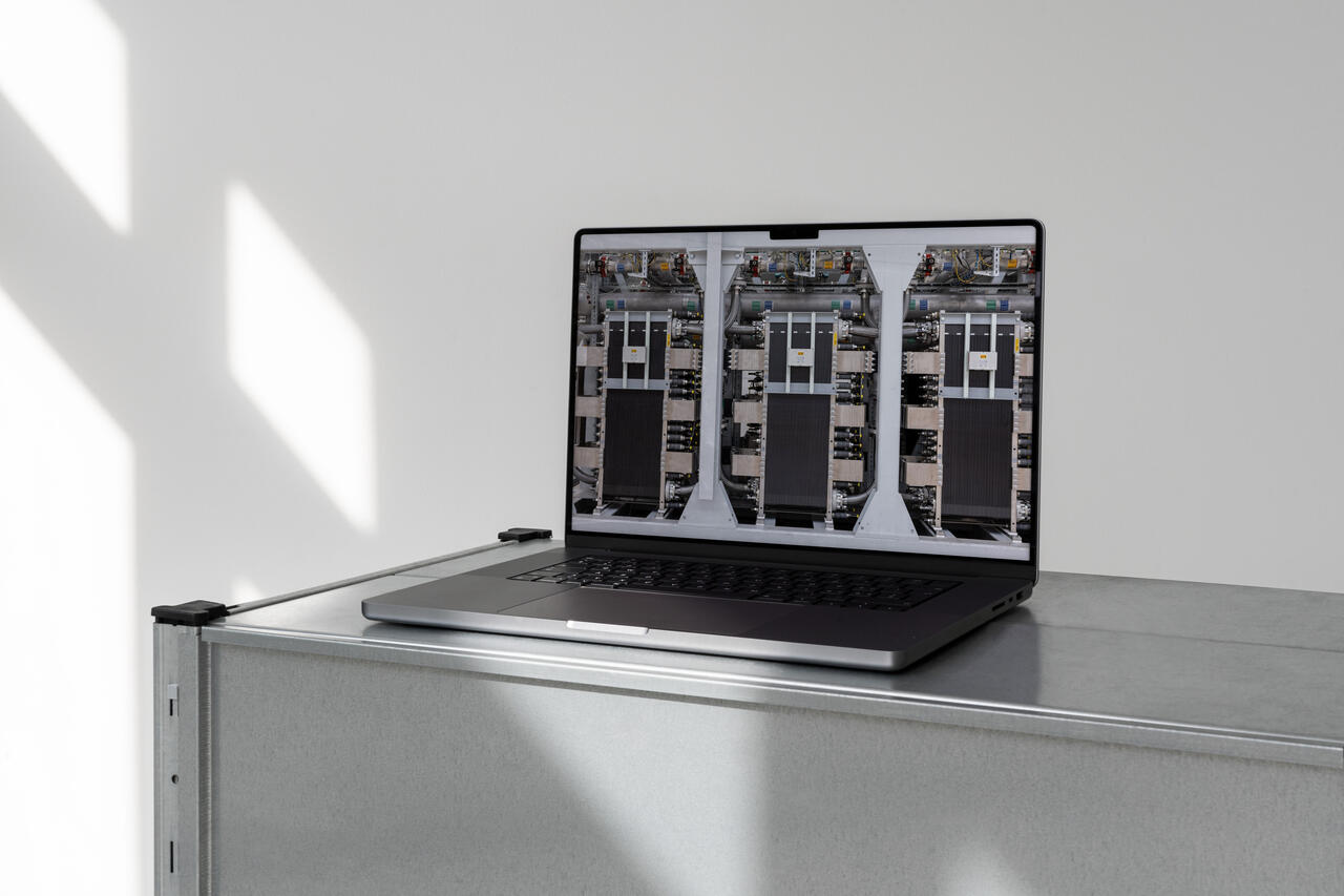 "Understanding moderate pressure PEM electrolysis" on a laptop